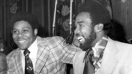 Caught in a light moment during the Dapper Dan Club festivities in this 1975 photo were the Steelers' Dwight White, left, and the Pirates' Manny Sanguillen.
