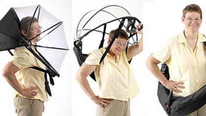 PG reporter Ann Belser demonstrates, from left, wearing, lifting and carrying the Nubrella.