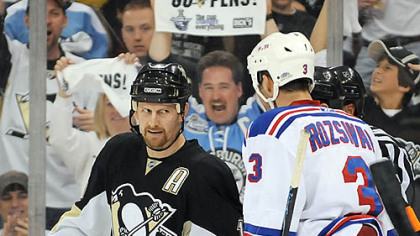 Could this man tank a game? Gary Roberts stares down New York's Michael Rozsival Sunday.
