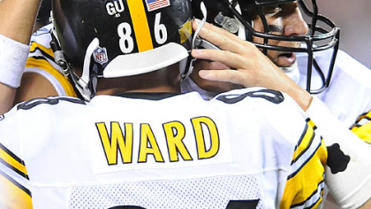 Ben Roethlisberger congratulates Hines Ward after their touchdown connection against the Browns in the second quarter.