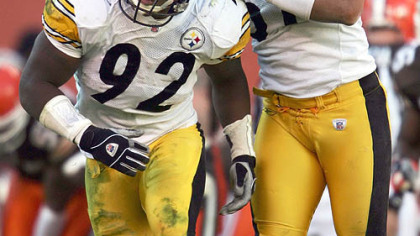 James Harrison, left, and James Farrior celebrate after Harrison makes a tackle against Cleveland in 2004.