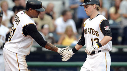 Luis Rivas congratulates Nate McLouth after McLouth hit a home run in the second inning last night in the Pirates' 10-7 victory against the Houston Astros. The victory opened a seven-game homestand for the Pirates before the All-Star break.