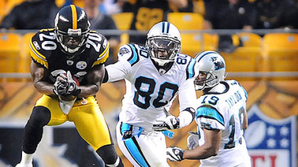 Bryant McFadden makes one of two interceptions the Steelers had against Carolina's Matt Moore in the first half last night.