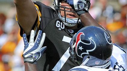 The Texans' Zac Diles can't stop Ben Roethlisberger from getting a pass off Sunday at Heinz Field.