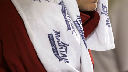 Cardinals starter Todd Wellemeyer sits in the dugout between innings last night in St. Louis.