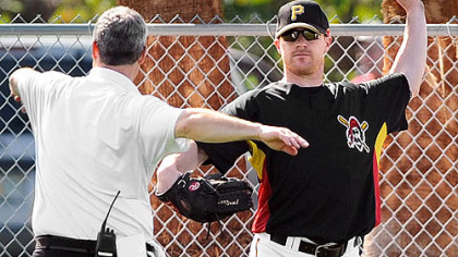 Chris Duffy took batting practice despite an injured shoulder.