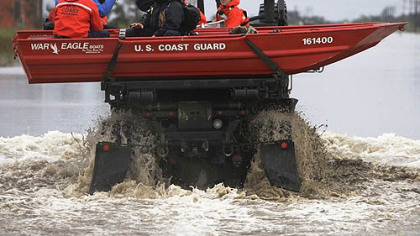 SABINE PASS, Tx. -- A Coast Guard search and rescue team heads into the flooded areas looking to help victims of Hurricane Ike.