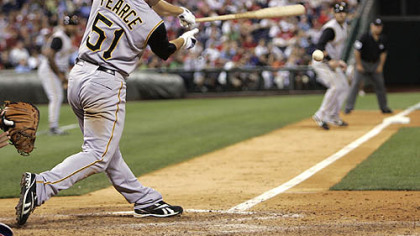 Steve Pearce connects for an RBI double in the 12th inning of a baseball game with the Philadelphia Phillies last night. Pearce drove in Ryan Doumit and the Pirates won 2-0.