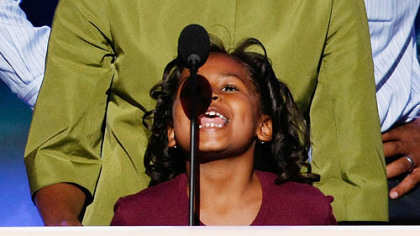 DENVER -- Sasha Obama looks up at her mother Michelle onstage prior to the Democratic National Convention opening.