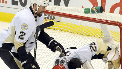 Red Wings' Valtteri Filppula crashes into goalie Marc-Andre Fleury in the first period.