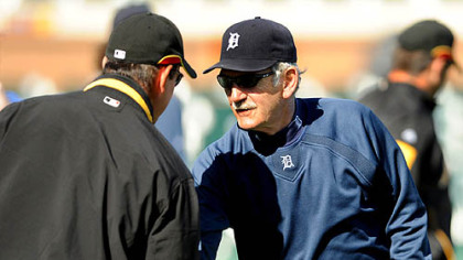 Pirates manager John Russell is greeted by Detroit Tigers manager and former Pirates skipper Jim Leyland before the start of Sunday's game at Lakeland Fla.