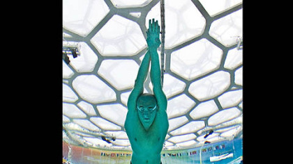 Shown from underwater, Hungary's Laszlo Cseh competes in the men's 200m butterfly swimming semifinal at the National Aquatics Center.