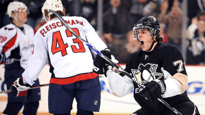Evgeni Malkin celebrates after scoring in the first period against the Capitals last night at Mellon Arena.