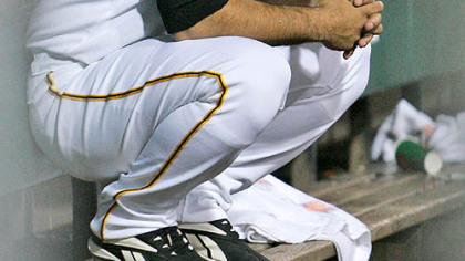 Raul Chavez in the Pirates dugout during a five-run sixth-inning by the Milwaukee Brewers in last night's baseball game at PNC Park.