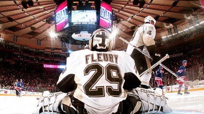 The Rangers' Brandon Dubinsky, far right, celebrates his power-play goal in the third period against goaltender Marc-Andre Fleury in Game 4 of the Eastern Conference semifinal in New York.