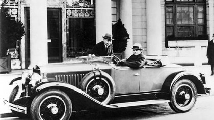 A 1927 LaSalle, the first production car designed by Harley Earl, at wheel, who is considered the father of automotive design.