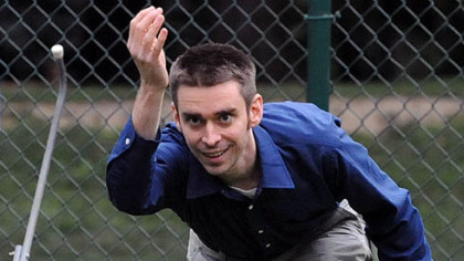 Jesse Sharrard makes his shot during a Wednesday night lawn bowling match and cookie fest.