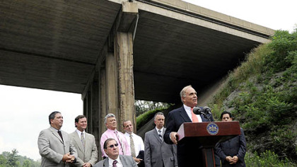 Gov. Ed Rendell speaks during a news conference below the Parkway East on Rodi Road in Penn Hills. The governor then signed a bill giving funding to bridge repairs.