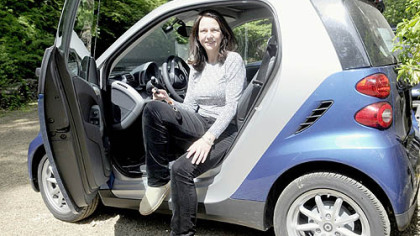 Patti Hollingshead with her new Smart car.
