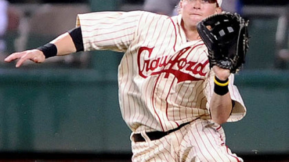 Pirates outfielder Nate McLouth makes a sliding catch on a ball hit by the Rays' Dioner Navarro in the third inning of last night's game.