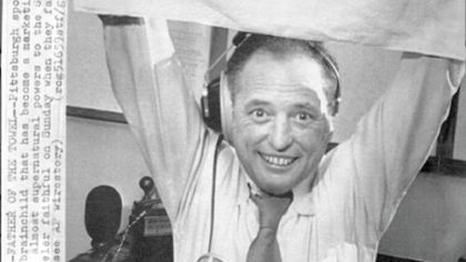 Myron Cope holding up a Terrible Towel in a 1979 photo.