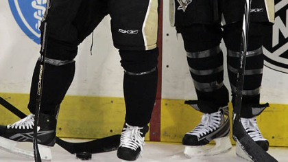 Sidney Crosby, left, with Georges Laraque, likes the Penguins chances. As for Hillary vs. Barack, no comment.