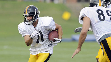 Jeremy Bloom makes a punt return.