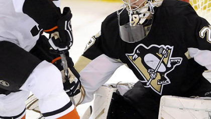 A shot by the Flyers' R.J. Umberger is stopped by the Penguins' Marc-Andre Fleury in the first period last night in Game 1 of the Eastern Conference final series at Mellon Arena.
