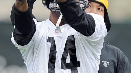 Steelers second-round draft choice Limas Sweed receives a few pointers from Hines Ward.