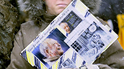 Sharon Cubarney, of Morningside, grasps her Myron Cope memorabilia during the ceremony.