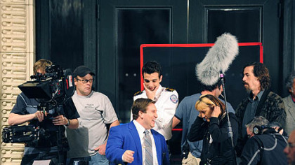Nate Torrence (center, in blue) and Jay Baruchel (behind Torrence) filming "She's Out of My League" at The Warhol on the North Side.