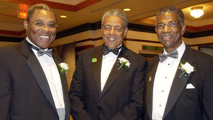 Dwight White, left, Tom Burley, and Thomas Motley, right at a FROGS formal event in 2004.