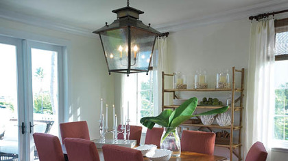 In the dining room of the HGTV Dream Home, a lantern lights the table instead of the usual chandelier.
