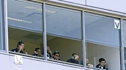 Joe Paterno, center with glasses, works Saturday's game against Purdue from the press box at Ross Ade Stadium in West Lafayette, Ind. It is the third consecutive game he has worked at least part of the game from the press box.