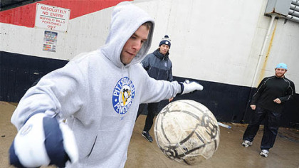 In the minutes leading up to one of his most watched starts of the season -- the Winter Classic on New Year's Day -- Ty Conklin stays loose by kicking a soccer ball around.