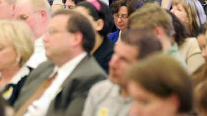 An overflow crowd in the Gold Room of the Allegheny County Courthouse listens yesterday to testimony at the Senate Judiciary Committee public hearing on Senate Bill 1250, a proposed constitutional amendment defining marriage.