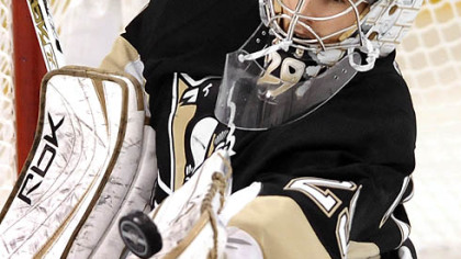 Penguins Marc-Andre Fleury makes a save against the Rangers in the second period Sunday.