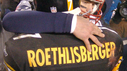 Roethlisberger gets a hug from New England Patriots quarterback Tom Brady after losing the AFC title game to the Patriots. (Jan. 23, 2005)
