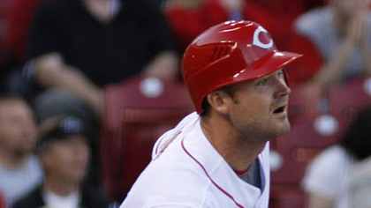 Cincinnati's David Ross hits a two-run home run off Pirates pitcher Tom Gorzelanny in the first inning of last night's game in Cincinnati.