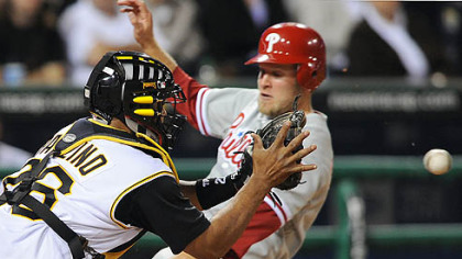 Philadelphia's Eric Bruntlett slides in ahead of the throw to Ronny Paulino last night.