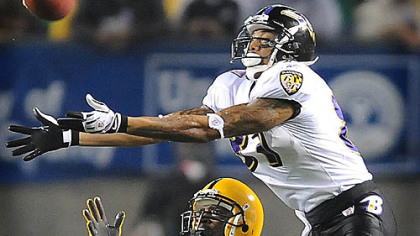Ryan Clark breaks up pass intended for the Ravens' Demetrius Williams last night.