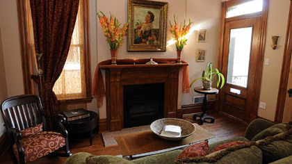 A small second-floor bedroom became a sitting room that leads to a deck.
