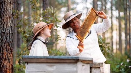 Dakota Fanning, left, and Queen Latifah from "The Secret Life of Bees."