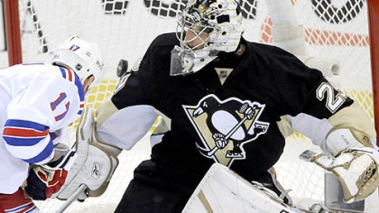 The Rangers' Dubinsky scores against Fleury.