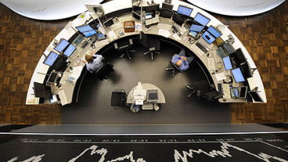 FRANKFURT -- The monitor of Germany's stock share index DAX, shows Tuesdays flucuations. Frankfurt stocks fell back into the red midmorning as a rebound from steep losses on Monday, Oct. 6,  ran out of steam amid fresh worries that German banks would fall victim to the financial crisis.