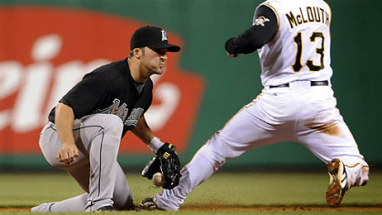 Nate McLouth is caught stealing at second base by the Marlins' Dan Uggla in the sixth inning.