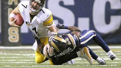 Roethlisberger grimaces while being sacked by the Rams. (Dec. 20, 2007)