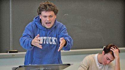 During the fifth round of competition at the Clarion University Autumn Leaf Debates last weekend Daniel Diamond, 20, a junior math and economics major at the University of Kentucky drives home one of his points as he talks about the elimination of government subsidies for factory farms. Seated next to Diamond is competitor Eddie Fitzgerald, 20, a junior at Liberty University of Virginia.