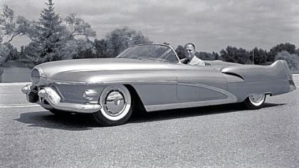 Harley Earl in the 1951 one-of-a-kind Le Sabre convertible that he designed.