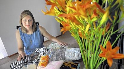 Mary Beth Karchella-MacCumbee with an assortment of the paperless products she makes.